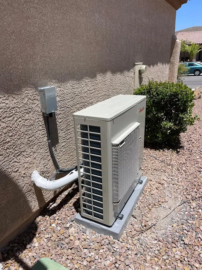 Residential air conditioning condenser unit in Central Falls